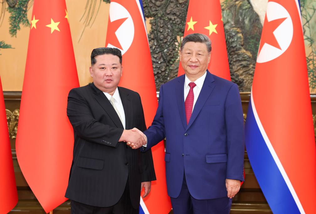 China, DPRK reaffirm friendship, vow closer ties as top leaders hold talks